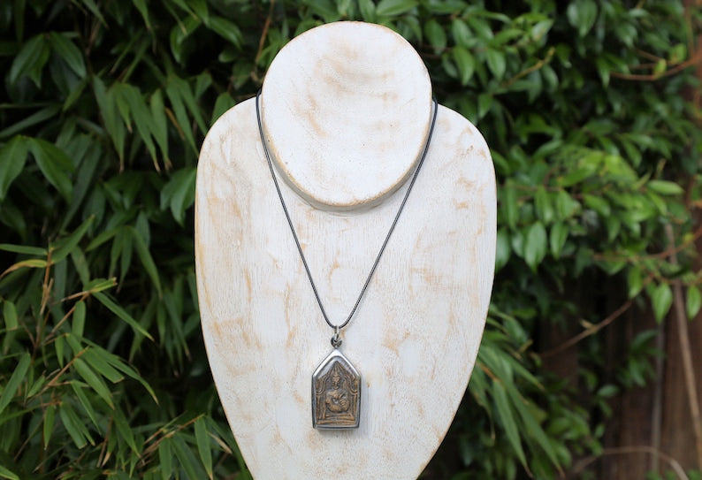 The Kun Peng+Ku Man Tong amulet represents a unique blend of Thai spiritual traditions, combining aspects of two distinct types