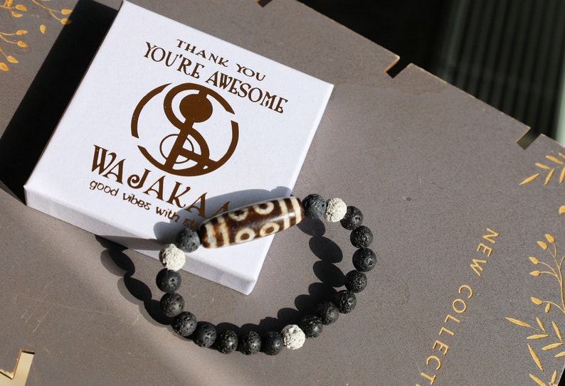 Old Eight-eye  eyed Dzi  bead Agate with black, white lava beads offer a unique and natural element to jewelry designs