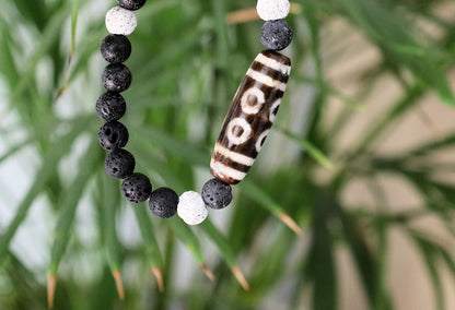 Old Eight-eye  eyed Dzi  bead Agate with black, white lava beads offer a unique and natural element to jewelry designs