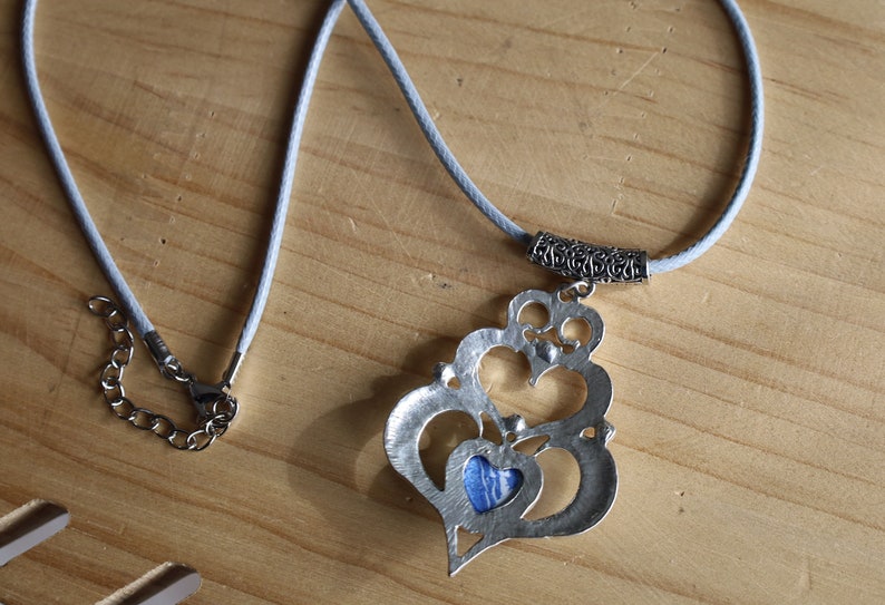 925 Silver Plated Blue white Calsilica  Calsilica,, is a man-made material known for its distinctive, highly individual appearance and vibrant layers of bold color.