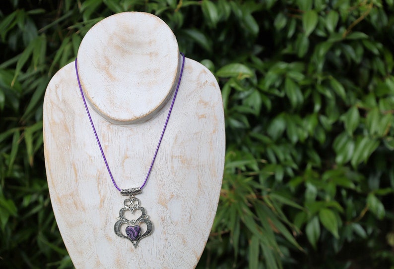 925 Silver Plated purple b/w Calsilica  Calsilica,, is a man-made material known for its distinctive, highly individual appearance and vibrant layers of bold color.