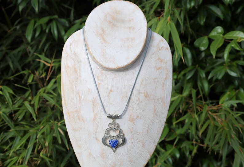 925 Silver Plated Blue white Calsilica  Calsilica,, is a man-made material known for its distinctive, highly individual appearance and vibrant layers of bold color.