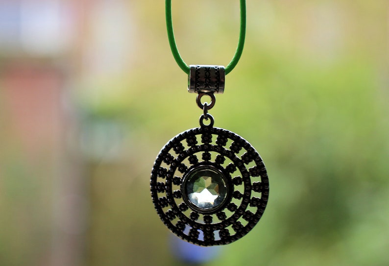 Peridot Art Piece. Peridot is a vibrant, green gemstone often associated with lightness and beauty. Traditionally, it's believed to bring healing and protective qualities, fostering a sense of well-being and emotional balance