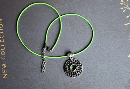 Peridot Art Piece. Peridot is a vibrant, green gemstone often associated with lightness and beauty. Traditionally, it's believed to bring healing and protective qualities, fostering a sense of well-being and emotional balance