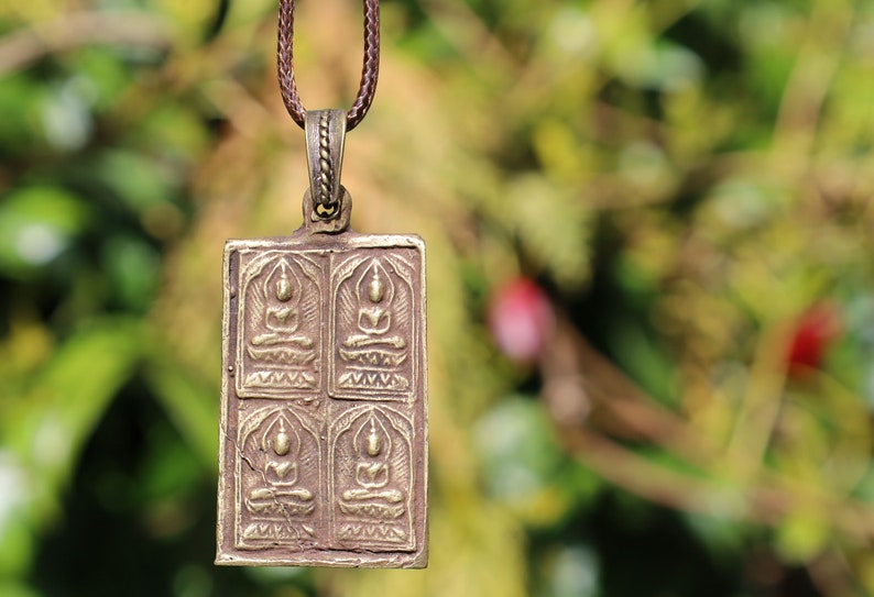 The amulet Phra Paen, created by Luang Pu Suk of Wat Pak Khlong Makham Thao, carries significant spiritual and cultural importance