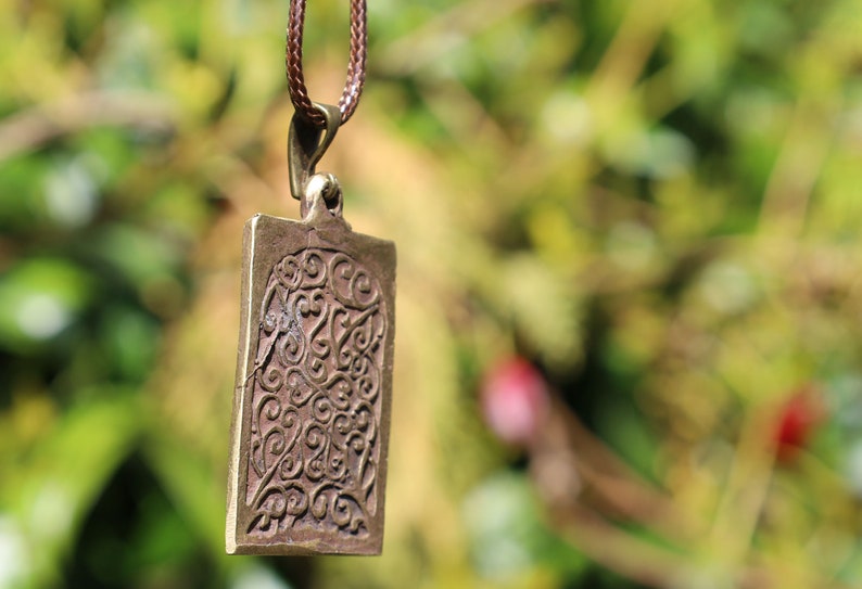 The amulet Phra Paen, created by Luang Pu Suk of Wat Pak Khlong Makham Thao, carries significant spiritual and cultural importance