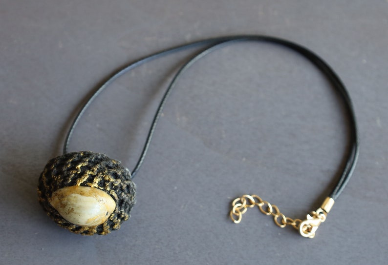 Takrut Bia Kae Shell Thai Amulet Buddha Pendant Talisman" likely holds significant cultural and spiritual meaning within Thai Buddhism