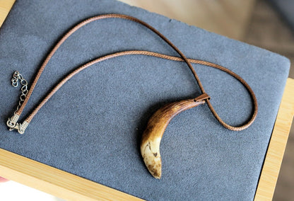 Wild Boar Teeth Natural Bone necklace. hunting traditions and are worn as symbols of bravery,strength,and connection to the outdoors