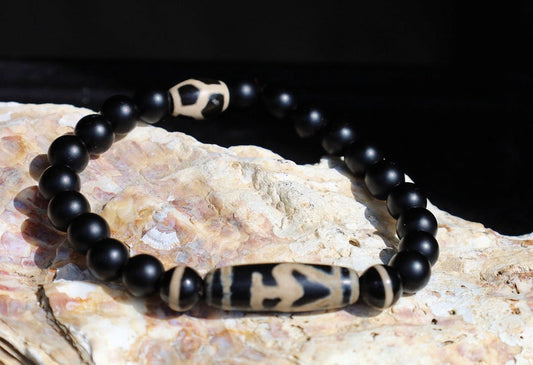 Nectar vesse" Dzi bead with Matte onyx beads and 3 medicine dzi beads. helping to balance the body's energies
