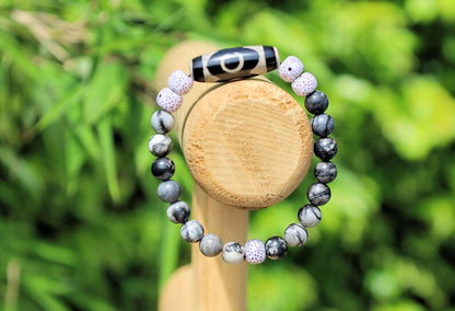Three-eye dZi bead with  Starmoon Bodhi Barrel Beads and Black silk stone beads. This is one of the most powerful beads