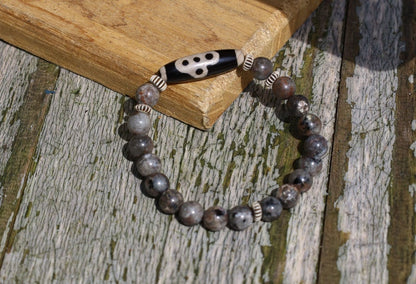 Seven-eye dZi bead with Yooperlite is a new crystal that was recently discovered in lake Superior near Michigan. And Chevron beads