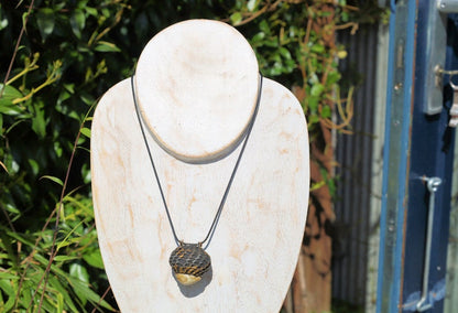 Takrut Bia Kae Shell Thai Amulet Buddha Pendant Talisman" likely holds significant cultural and spiritual meaning within Thai Buddhism