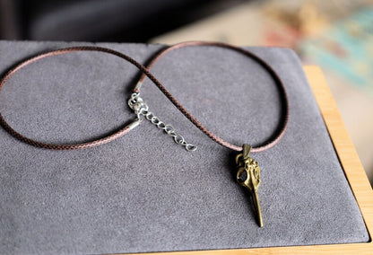 Plague Doctor Bird Mask Necklace Raven Skull, color bronze. size 9 mm x 40 mm, total weight 6 gr.