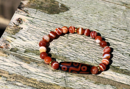 Nine-eye dZi bead with beautiful Orange striped agate beads. The Star of Prosperity and the Heaven Protection