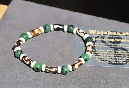Unique and Artistic Epidote ruby bracelet with Black and white Tribal Tube Bone Beads. Made in India