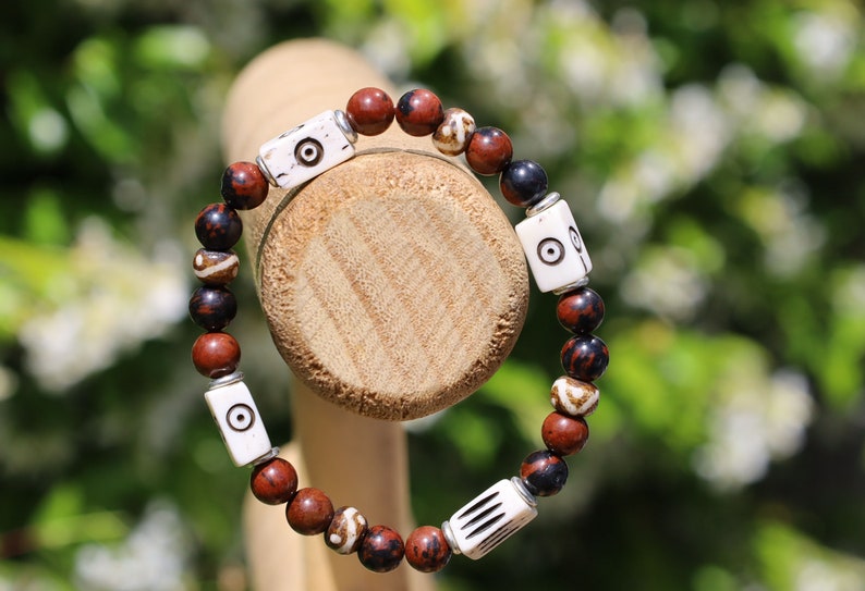 Unique and Artistic  Golden Swan bracelet with white tube bone beads with patterns. WAJAKAA DESIGNS - The art of expressing your taste and style.