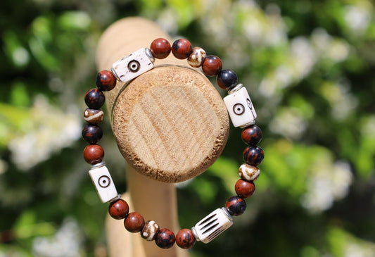 Unique and Artistic  Golden Swan bracelet with white tube bone beads with patterns. WAJAKAA DESIGNS - The art of expressing your taste and style.