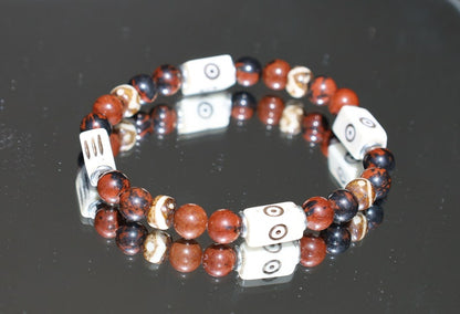 Unique and Artistic  Golden Swan bracelet with white tube bone beads with patterns. WAJAKAA DESIGNS - The art of expressing your taste and style.