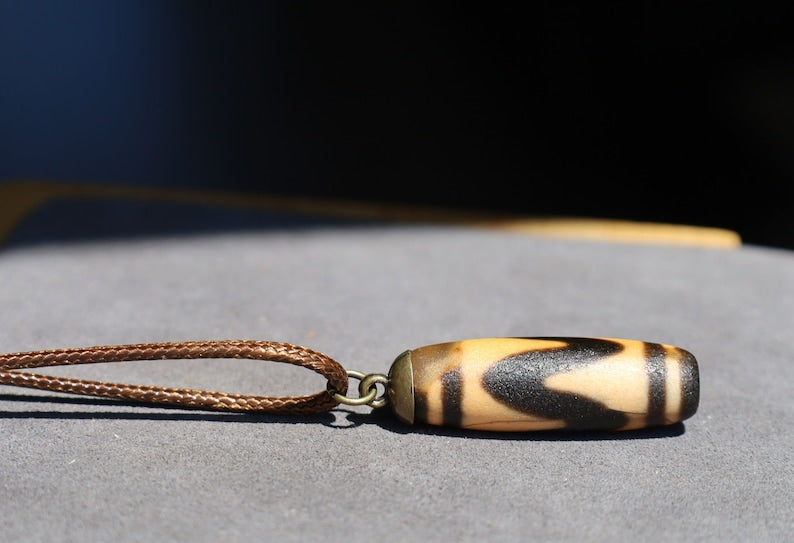 Rare to find, Old DZI Tiger's pattern necklace.good fortune, and spiritual enlightenment to their wearers