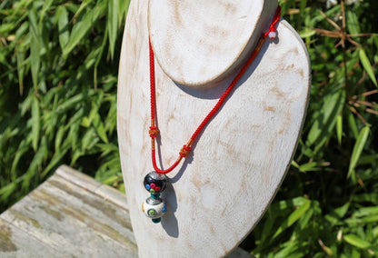 Introducing our exquisite Double Handmade Tibetan Style Round Beads Necklace, featuring a unique blend of craftsmanship and tradition