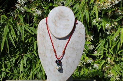 Introducing our exquisite Double Handmade Tibetan Style Round Beads Necklace, featuring a unique blend of craftsmanship and tradition