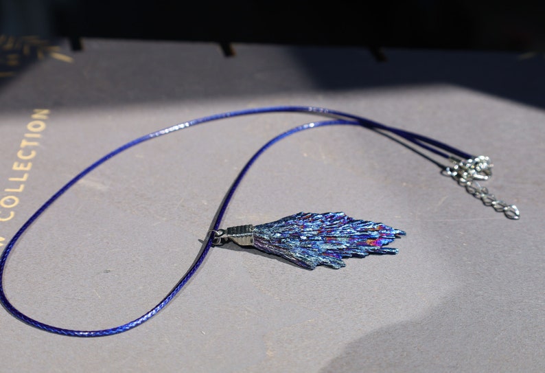 Black Tourmaline and Blue Titanium Aura Quartz Crystal, each with its own unique meanings and properties in the realm minerals