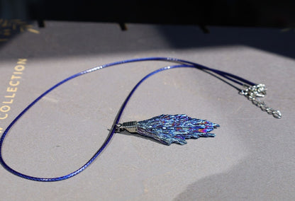 Black Tourmaline and Blue Titanium Aura Quartz Crystal, each with its own unique meanings and properties in the realm minerals
