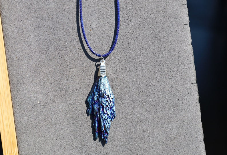 Black Tourmaline and Blue Titanium Aura Quartz Crystal, each with its own unique meanings and properties in the realm minerals