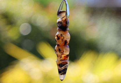 Tibetan Natural Old Agate Dzi skulls Carved Ritual Implement Pendants.combining these elements can be considered a powerful spiritual tool