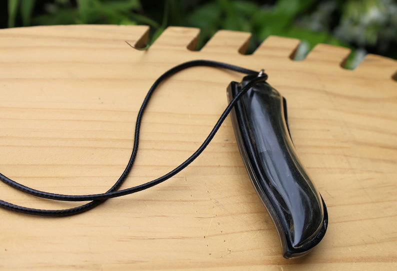 Meed Mor is a traditional Thai knife known for its spiritual and cultural significance. It is often used in rituals and ceremonies