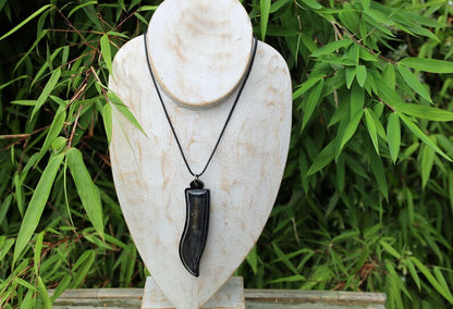 Meed Mor is a traditional Thai knife known for its spiritual and cultural significance. It is often used in rituals and ceremonies
