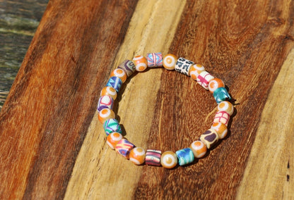 Polymer Clay Colorful  and Electroplate Glass Beads Evil eye. is believed to absorb negative energy or deflect.