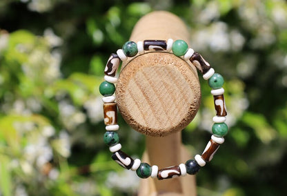 Unique and Artistic Epidote ruby bracelet with Black and white Tribal Tube Bone Beads. Made in India