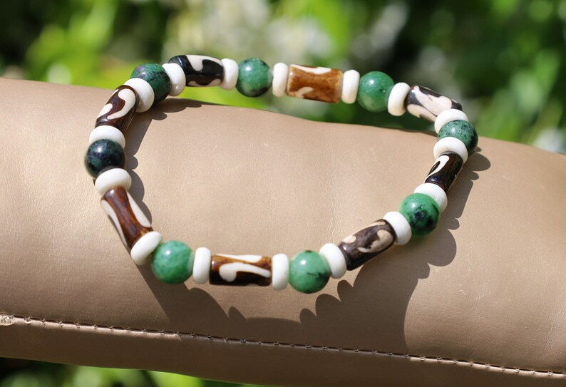 Unique and Artistic Epidote ruby bracelet with Black and white Tribal Tube Bone Beads. Made in India