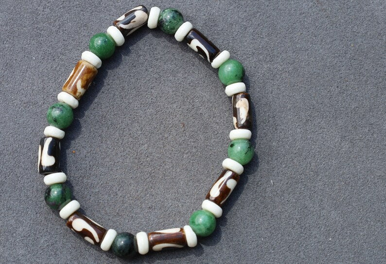 Unique and Artistic Epidote ruby bracelet with Black and white Tribal Tube Bone Beads. Made in India