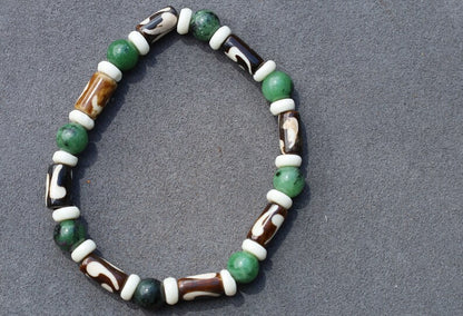 Unique and Artistic Epidote ruby bracelet with Black and white Tribal Tube Bone Beads. Made in India