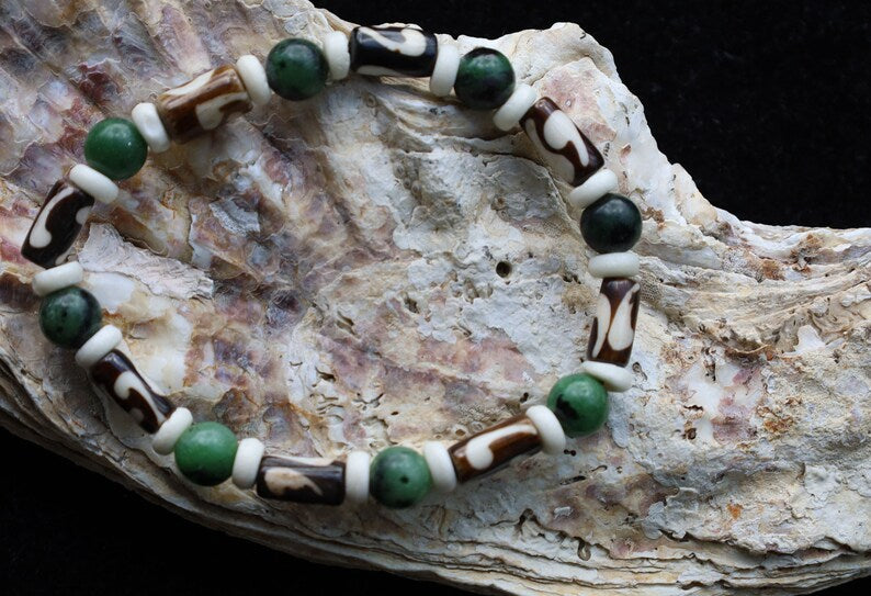 Unique and Artistic Epidote ruby bracelet with Black and white Tribal Tube Bone Beads. Made in India