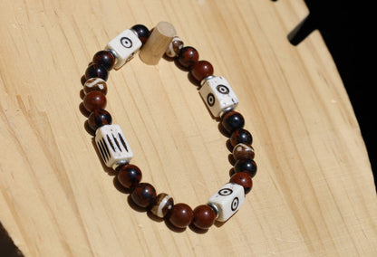 Unique and Artistic  Golden Swan bracelet with white tube bone beads with patterns. WAJAKAA DESIGNS - The art of expressing your taste and style.