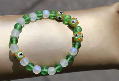 Beautiful Moldavite 8 mm and Frosted Glitter Glass and green Lampwork bead bumps. Wajakaa, one of a kind, unique and stylish