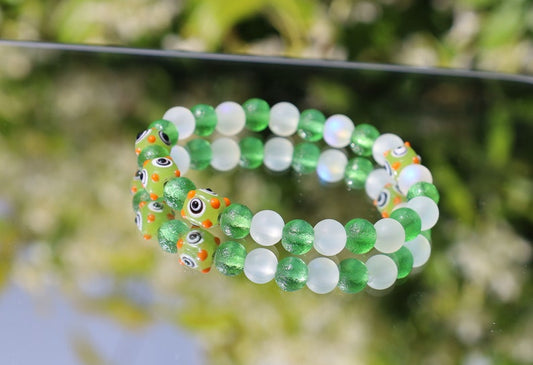Beautiful Moldavite 8 mm and Frosted Glitter Glass and green Lampwork bead bumps. Wajakaa, one of a kind, unique and stylish