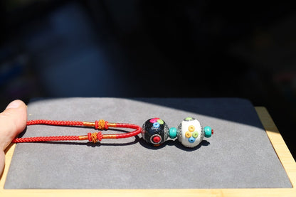 Introducing our exquisite Double Handmade Tibetan Style Round Beads Necklace, featuring a unique blend of craftsmanship and tradition