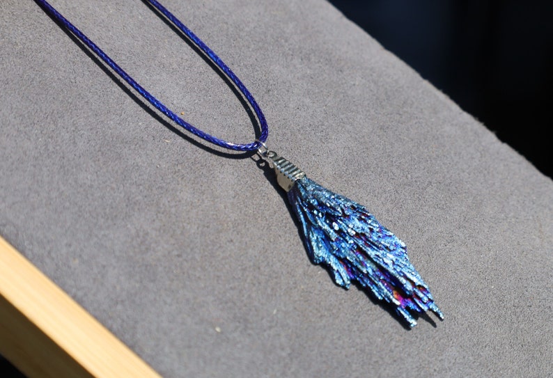 Black Tourmaline and Blue Titanium Aura Quartz Crystal, each with its own unique meanings and properties in the realm minerals