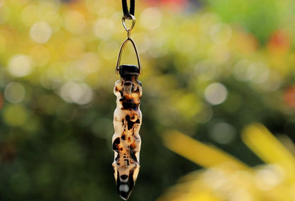 Tibetan Natural Old Agate Dzi skulls Carved Ritual Implement Pendants.combining these elements can be considered a powerful spiritual tool