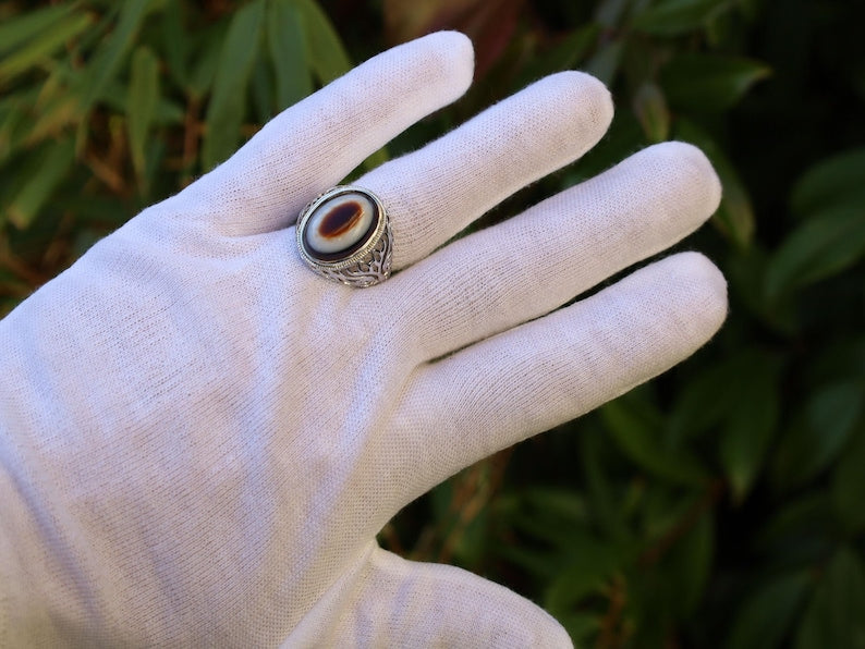 Handmade Tibetan Evil-Eye dZi Bead Ring. This ring is ideal for those seeking both style and spiritual protection.