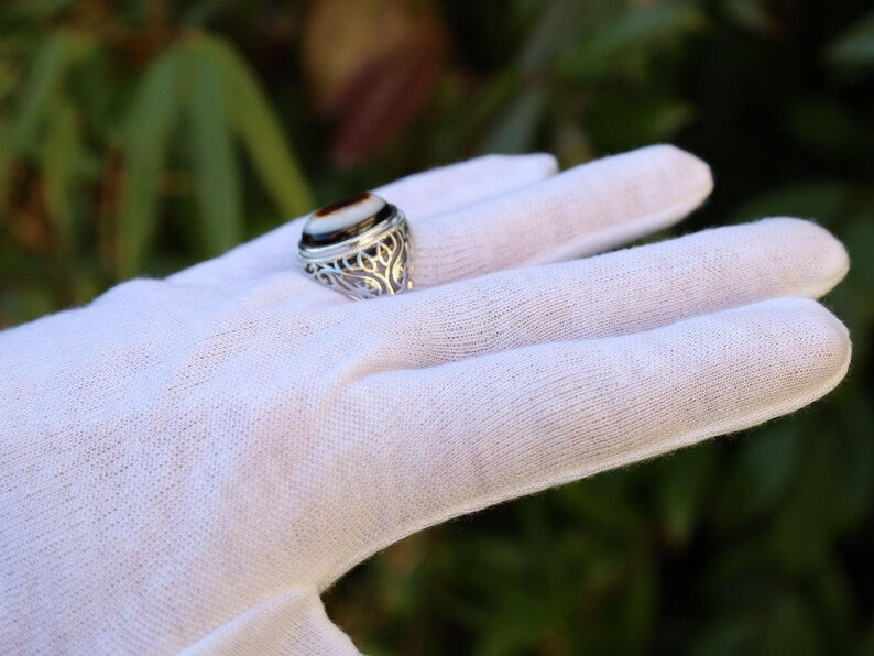 Handmade Tibetan Evil-Eye dZi Bead Ring. This ring is ideal for those seeking both style and spiritual protection.