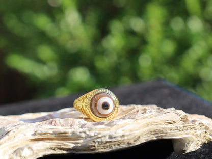 Handmade Tibetan Evil-Eye dZi Bead Ring. This ring is ideal for those seeking both style and spiritual protection.