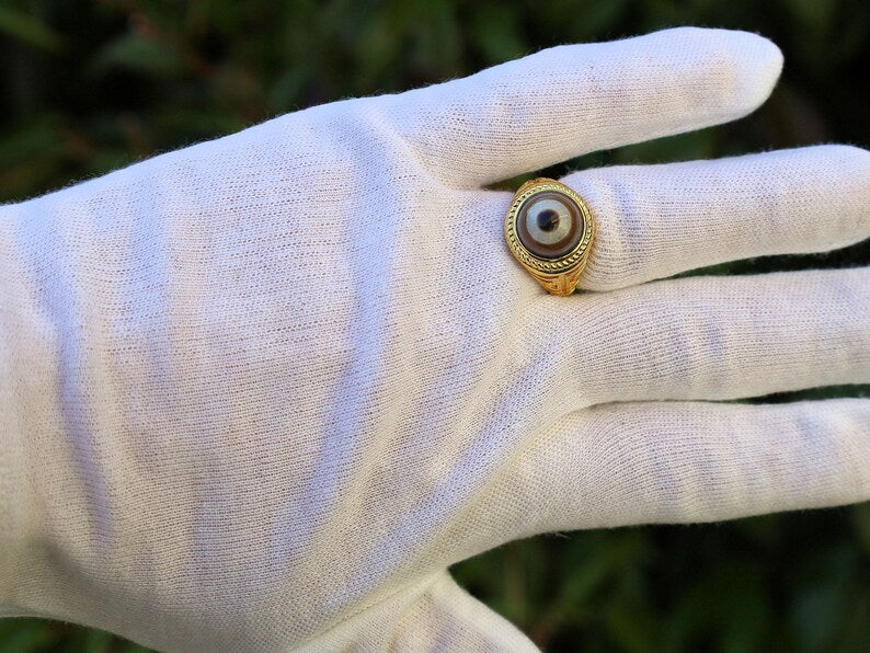 Handmade Tibetan Evil-Eye dZi Bead Ring. This ring is ideal for those seeking both style and spiritual protection.
