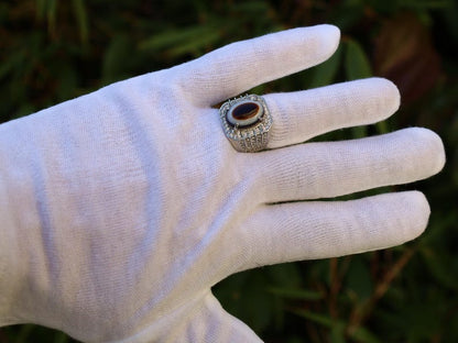 Handmade Tibetan Evil-Eye dZi Bead Ring. This ring is ideal for those seeking both style and spiritual protection.