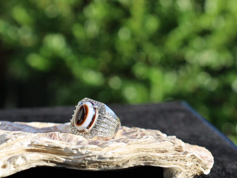 Handmade Tibetan Evil-Eye dZi Bead Ring. This ring is ideal for those seeking both style and spiritual protection.
