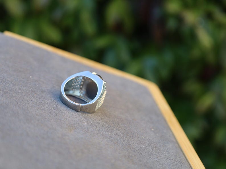 Handmade Tibetan Evil-Eye dZi Bead Ring. This ring is ideal for those seeking both style and spiritual protection.
